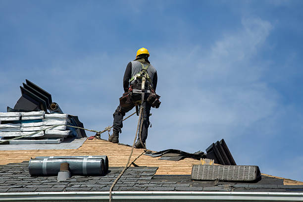 Professional Storm Damage Roof Repair technician working in Windber, PA